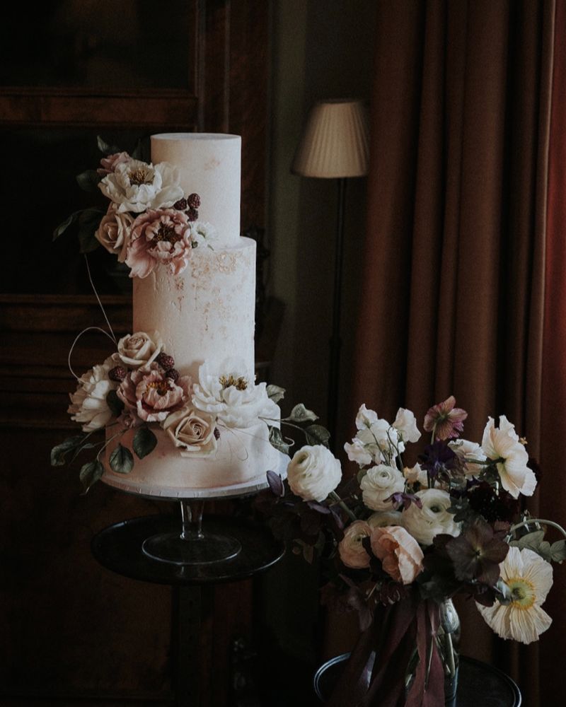 a wedding cake with flowers
