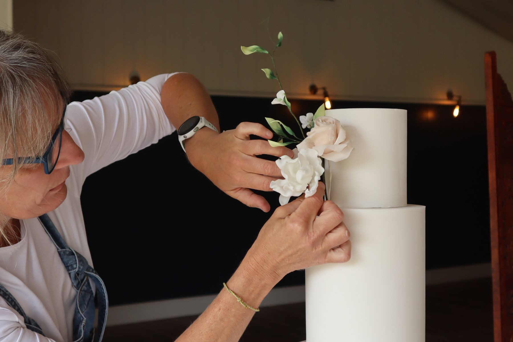 Alison decorating a cake